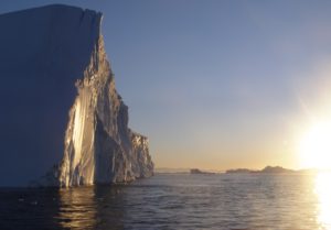 Midnight sun catches a large iceberg in Disko Bay, West Greenland. Credit: K. Briggs